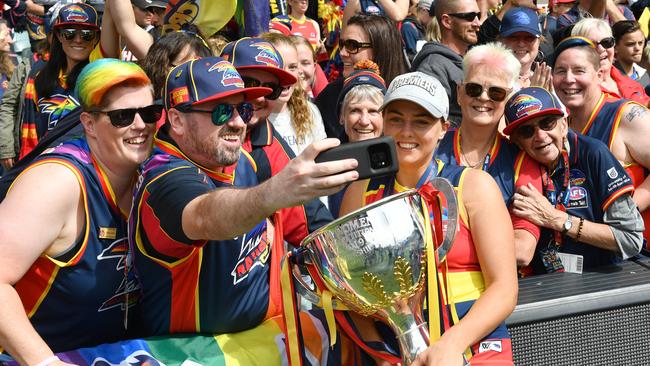 The crowd gathers with Ebony Marinoff to celebrate Adelaide’s grand final triumph. Picture: AAP/ Keryn Stevens.