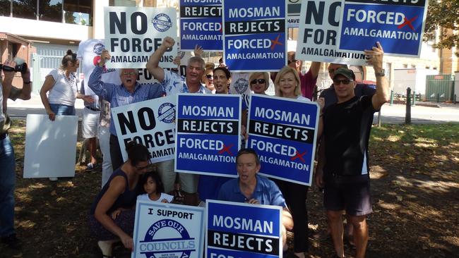 Anti-merger protesters making their voices heard in the Domain. Picture: Will Tuck