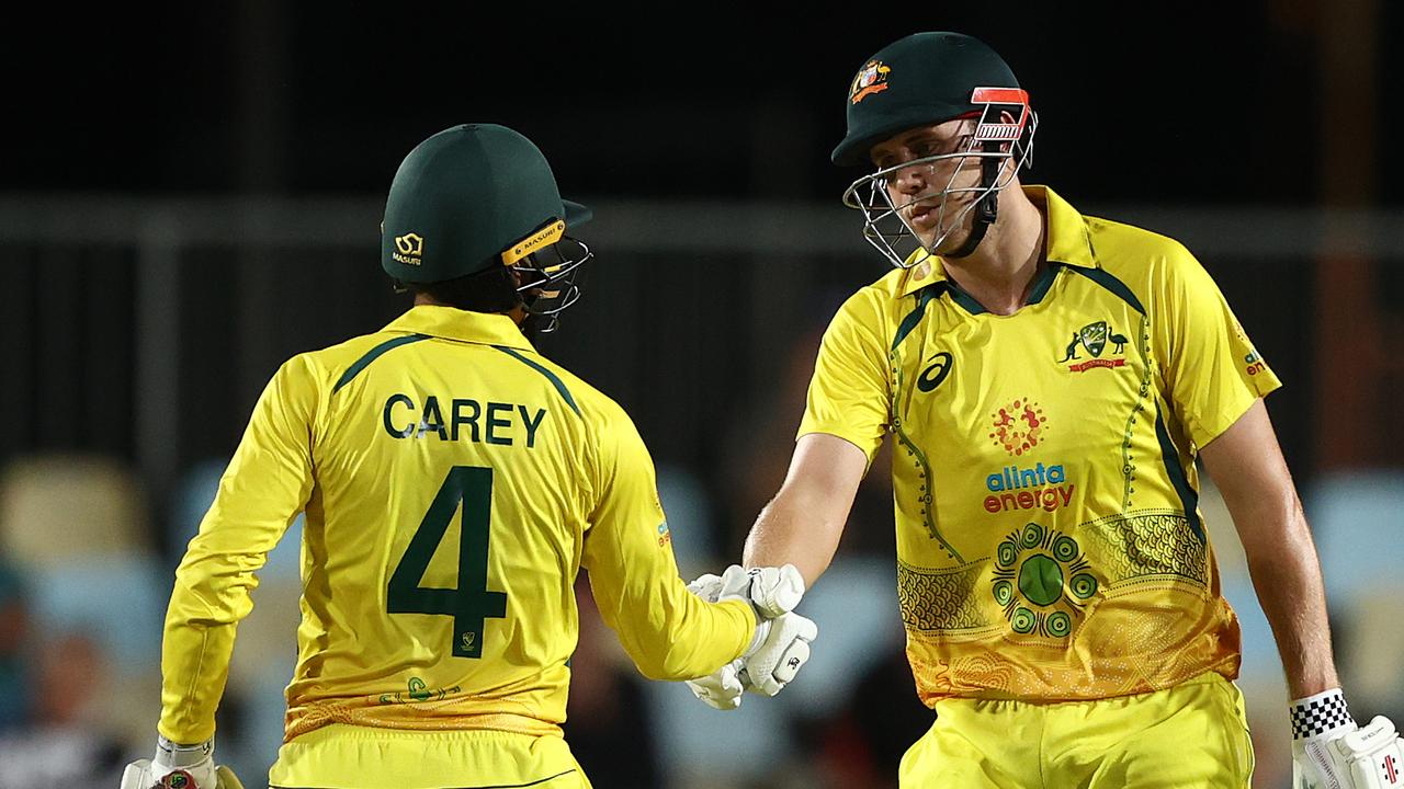 Cameron Green of Australia celebrates with Alex Carey after bringing up his half-century. Photo by Robert Cianflone/Getty Images