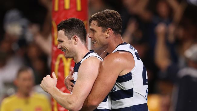 AFL. 1st Semi Final. 10/10/2020. Geelong vs Collingwood at the Gabba, Brisbane. Tom Hawkins of the Cats celebrates his goal in the fourth quarter with Patrick Dangerfield. Pic: Michael Klein