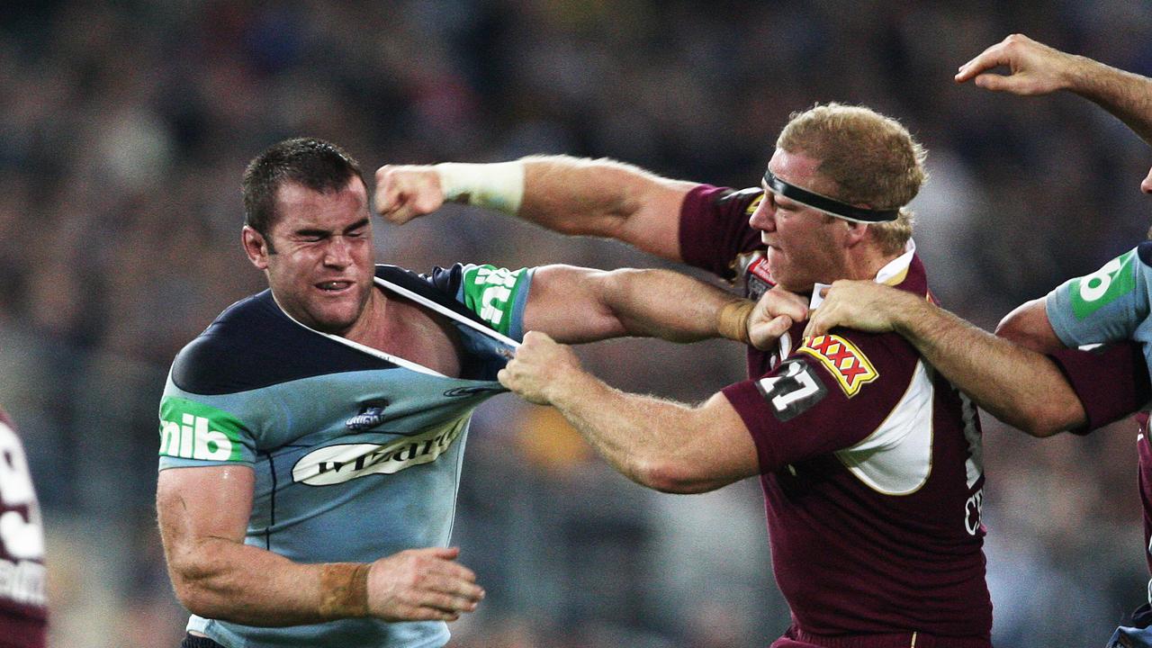 Justin Poore (L) and Michael Crocker let their fists fly.