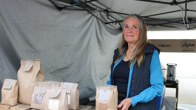 Antonia Gretschmann from Elgaars Farm with grains grown by her daughter and son-in-law at Farmgate Market. Picture: Elise Kaine