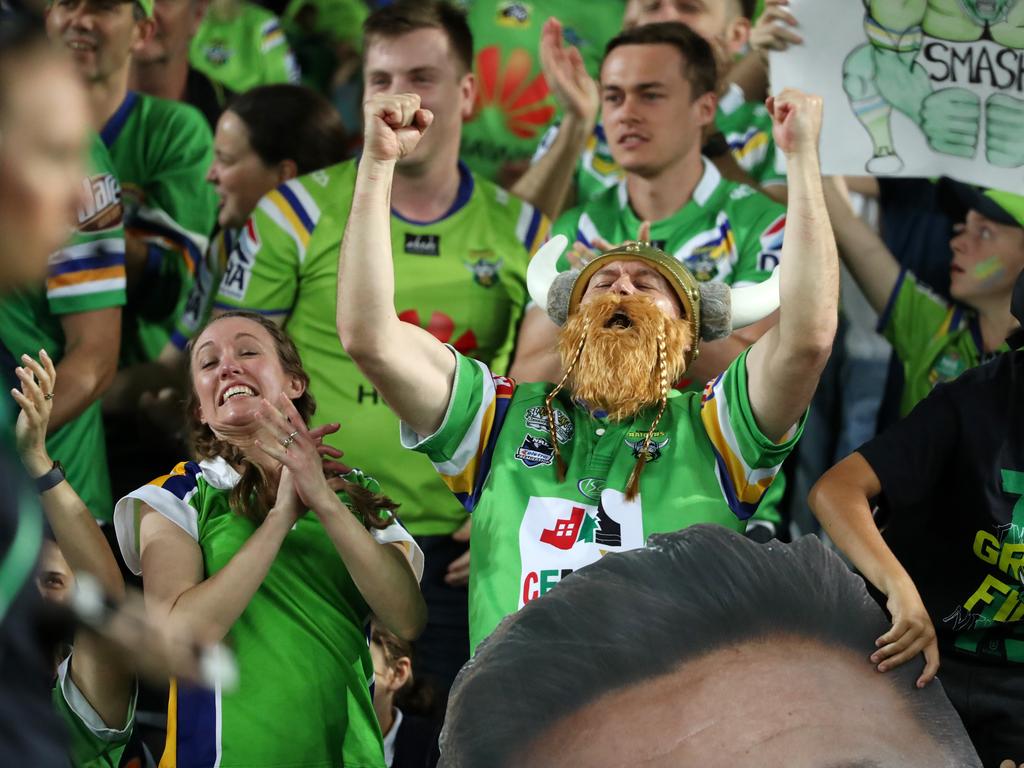 Raiders fans celebrating Jack Wighton's try during the 2019 NRL Grand Final between the Sydney Roosters and Canberra Raiders at ANZ Stadium, Sydney Olympic Park. Picture: Jonathan Ng