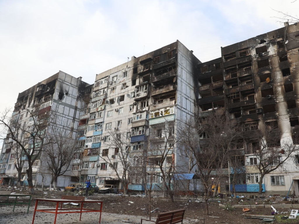 A view of heavily damaged buildings after shelling in the Ukrainian city of Mariupol under the control of Russian military and pro-Russian separatists.