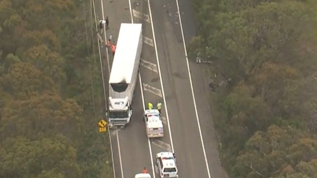 Paramedics treated three people for burns after a truck and car collided on a major highway. Picture: 9News