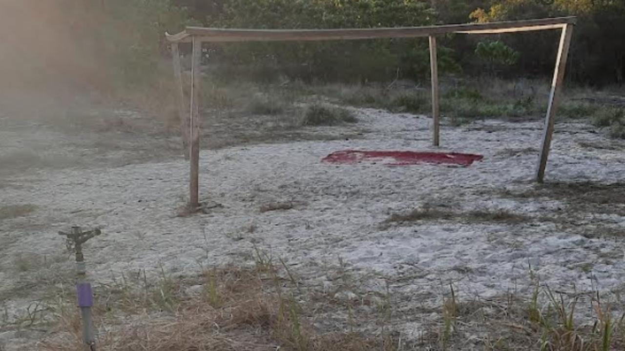 Structures left in place, and an irrigation pipe (bottom left) after a doof doof party at The Spit on the Gold Coast.