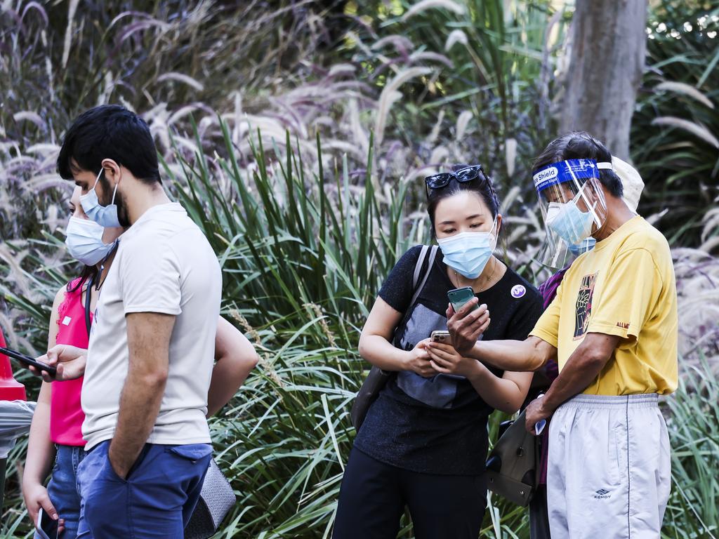 People wait at the Covid-19 vaccination hub at Homebush, Sydney. Picture: NCA NewsWire/Dylan Robinson