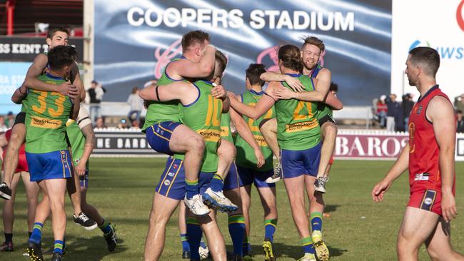 Golden Grove celebrates its 2020 division three premiership. Picture: Emma Brasier