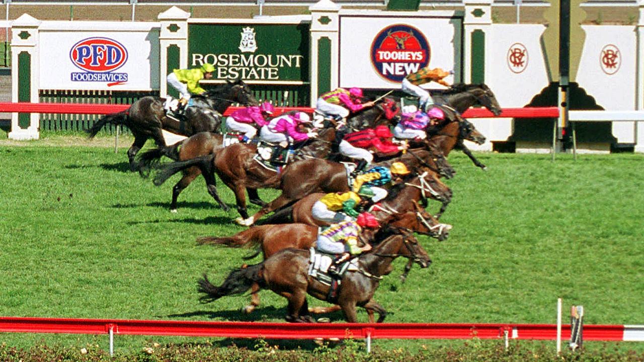 MARCH 9, 2002 : Racehorse Rubitano (rails) ridden by jockey <a target=