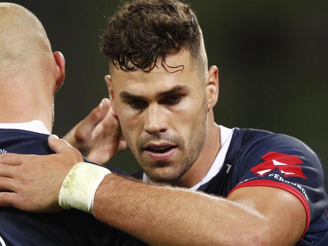 Tom English of the Rebels (right) celebrates a Bill Meakes (centre) try during the Round 3 Super Rugby match between the Melbourne Rebels and the Highlanders at AAMI Park in Melbourne, Friday, March 1, 2019. (AAP Image/Daniel Pockett) NO ARCHIVING, EDITORIAL USE ONLY