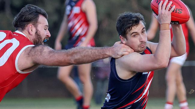 EFL Division 3 2022: Waverley Blues v Warrandyte at Mt Waverley Reserve, 18th June, Mt Waverley, Melbourne.  Ryan Mcnamara of Waverley Blues runs evades the tackle from Taylor Hayton of Warrandyte. Picture : George Salpigtidis