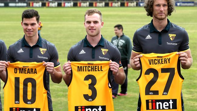 Jaeger O’Meara, Tom Mitchell and Ty Vickery with their new numbers. Picture: Michael Klein