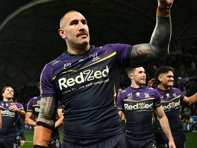 MELBOURNE, AUSTRALIA - SEPTEMBER 27: Nelson Asofa-Solomona of the Storm celebrates victory following during the NRL Preliminary Final match between the Melbourne Storm and Sydney Roosters at AAMI Park on September 27, 2024 in Melbourne, Australia. (Photo by Quinn Rooney/Getty Images)