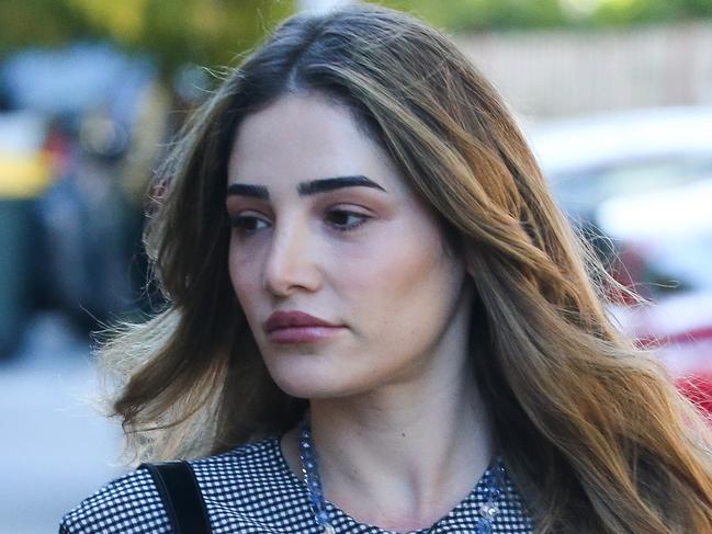 SYDNEY, AUSTRALIA - Newswire Photos -MAY 10 2023: Ashlyn Nassif the glamorous daughter of controversial property developer Jean Nassif alleged to have supplied a bank with fake pre-sales contracts in order to obtain a $150 million loan to help her father build one of Sydneyâs biggest apartment projects is seen arriving at Burwood Court in Sydney. Picture NCA Newswire / Gaye Gerard