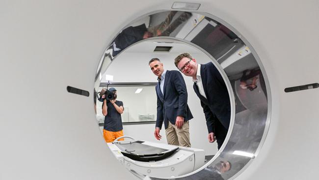 Premier Peter Malinauskas and Health Minister Chris Picton with a new CAT scanner inside the new 52-bed wing of the Queen Elizabeth Hospital. Picture: NCA NewsWire / Brenton Edwards