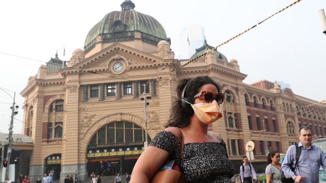 Melburnians are investing in face masks to combat the smoke haze. Picture: David Crosling/AAP