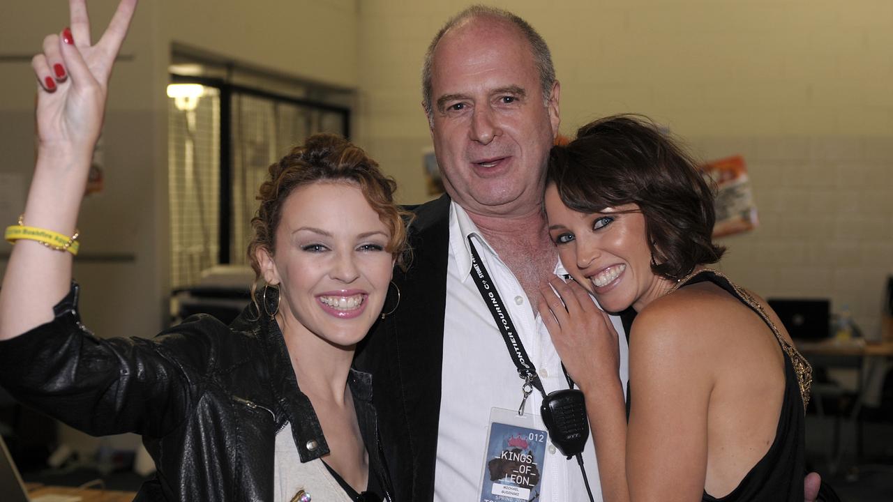 Kylie Minogue backstage with her sister Dannii Minogue and record executive Michael Gudinski at Sound Relief Bushfire Benefit Concert in 2009. Picture Martin Philbey/Redferns