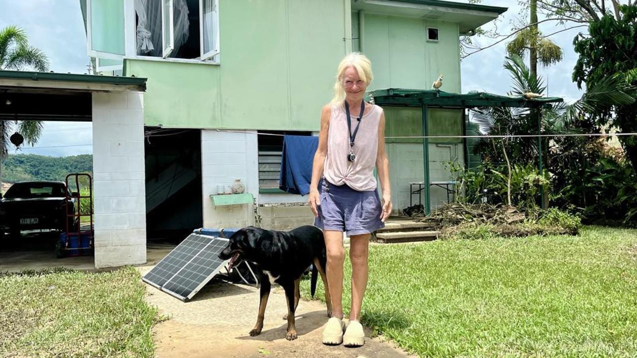 Camille O'Sullivan, a Catholic Education teacher, outside her flood-ravaged home in Cordelia on the banks on the Herbert River. Picture: Cameron Bates