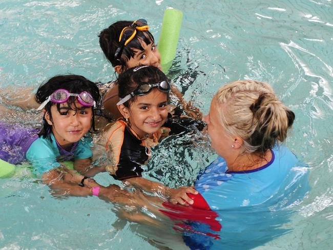 refugee swimming lessons Guildford | Daily Telegraph