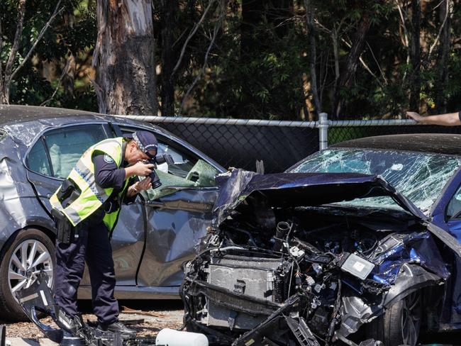 Police at the scene of a fatal crash at the intersection of Castle Hill Drive and Dohles Rocks road at Murrumba Downs on Thursday. Picture Lachie Millard