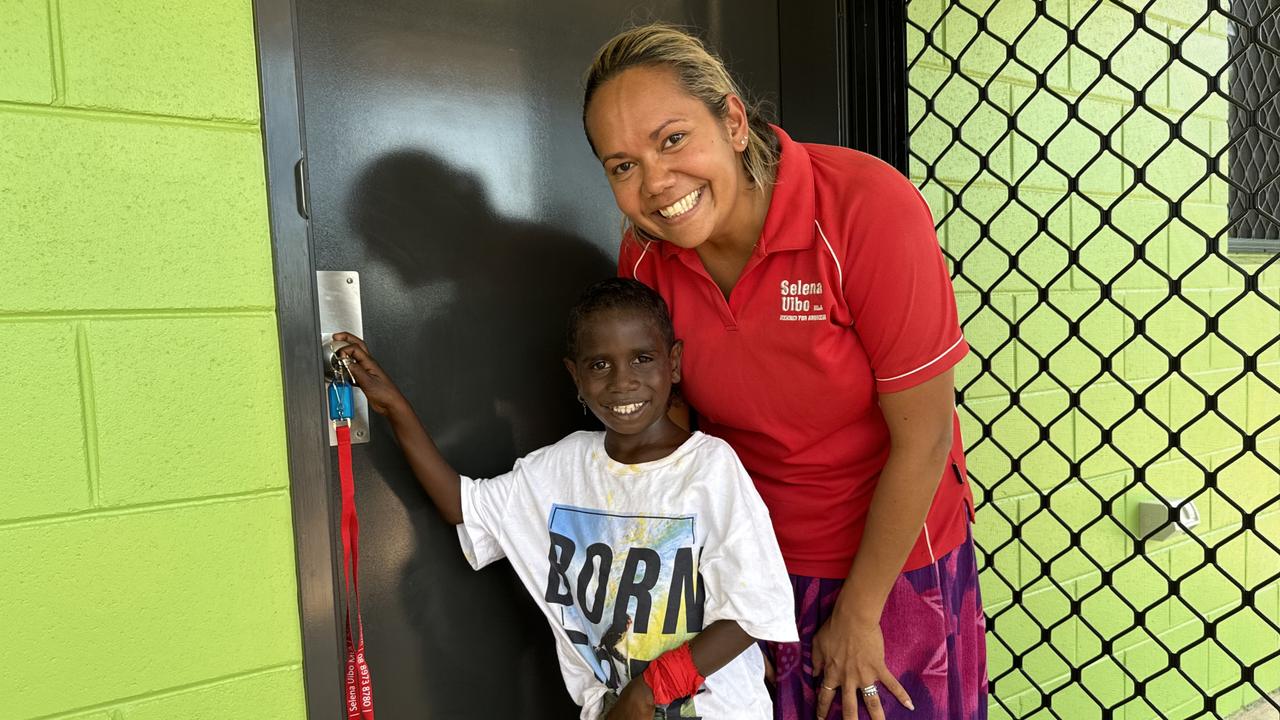 Remote Housing Minister Selena Uibo with a young Gapuwiyak resident at a new build. Picture: Supplied.