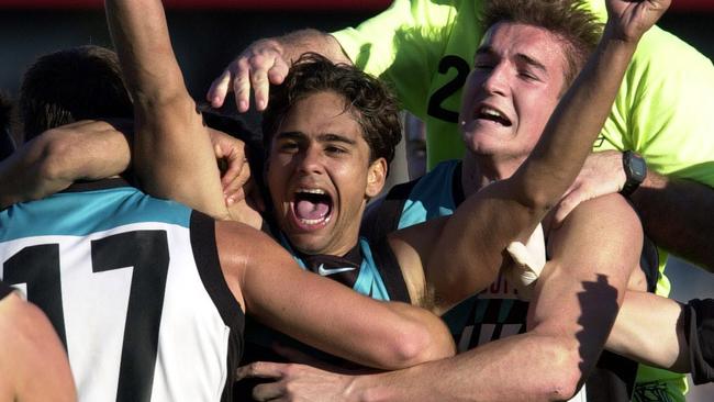 Peter Burgoyne celebrates the goal after the siren against Carlton in 2000.