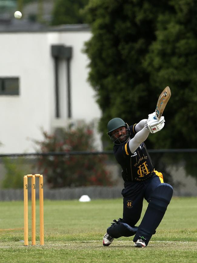 Bevan Roberts of Heathmont plays a shot square of the wicket.