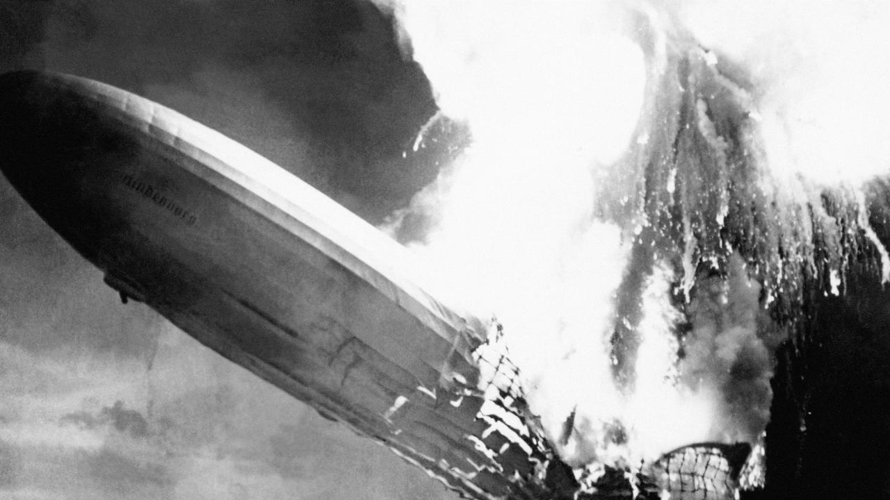 Germany's airship Hindenburg explodes in a ball of fire as it lands in Lakehurst, New Jersey, on May 6, 1937, killing at least 36 of passengers and crew.