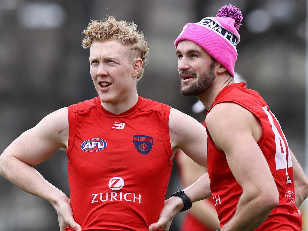 Melbourne training at GoschÃ&#149;s Paddock. 25/07/2021. Clayton Oliver and Joel Smith of the Demons at training today. Pic: Michael Klein