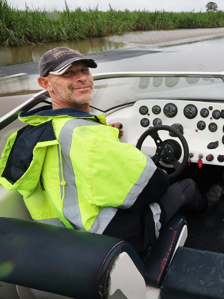 Flooding on the Gold Coast in the aftermath of Cyclone Alfred. Stapylton homes surrounded by floodwaters. Tony Bailey from Airlift Hovercraft, uses one to check on the welfare of his neighbours.