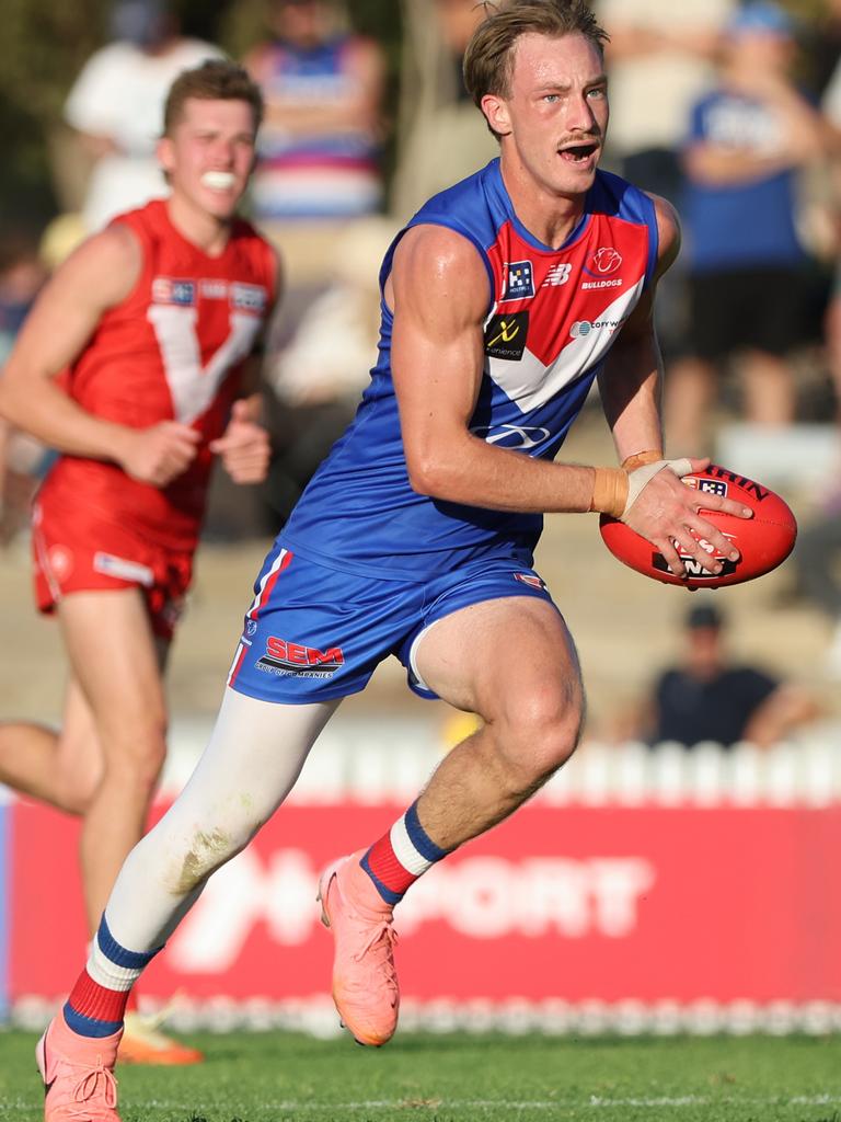 Mani Liddy in full stride, wearing his protective leg sleeve, against North Adelaide at Prospect Oval in Round 3. Picture: David Mariuz/SANFL