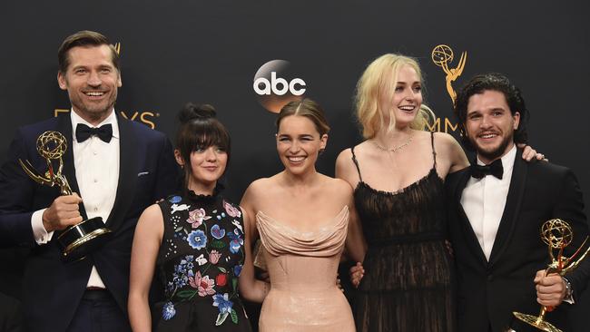 Nikolaj Coster-Waldau, from left, Maisie Williams, Emilia Clarke, Sophie Turner, and Kit Harington winners of the award for outstanding drama series for Game of Thrones. Picture: AP