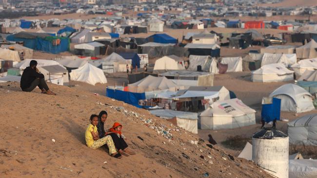 Palestinian children at a tent city housing the displaced in Rafah in the southern Gaza Strip on Saturday. Picture: AFP