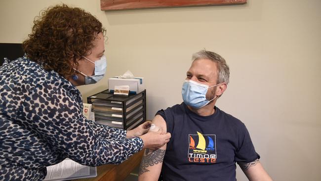 Victoria's chief health officer Brett Sutton receives his second AstraZeneca vaccine from Dr Gillian Ambrose at The Hills Medical Practice at Olinda. Picture: NCA NewsWire / Andrew Henshaw