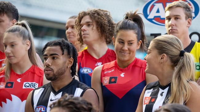 Melbourne’s Libby Birch speaks with Magpie Sarah Rowe at the AFL’s celebration of 18 clubs being in the men’s and women’s competitions for the first time. Picture: Mark Stewart