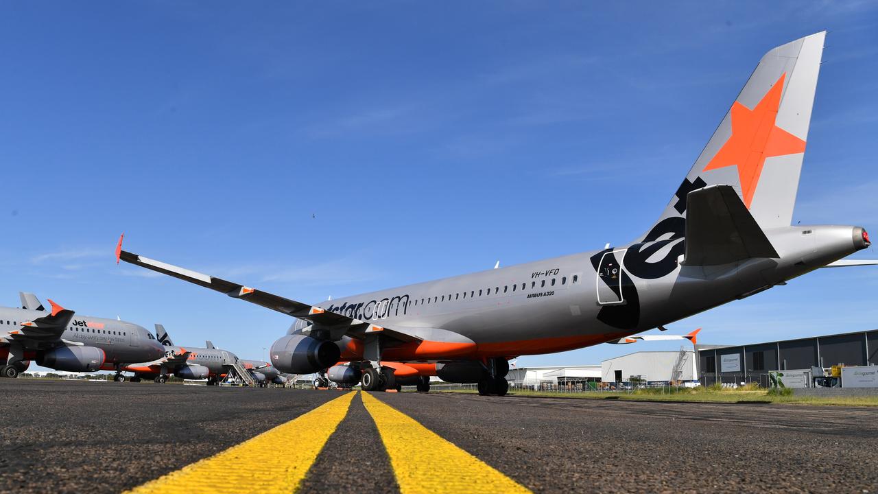 Grounded Jetstar aircraft parked at Brisbane Airport. Picture: Darren England/AAP