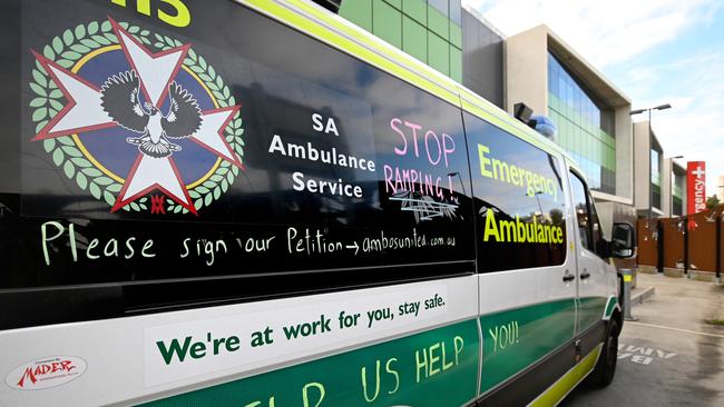 Messages written on the site of an ambulance. The government says a new deal includes an agreement to cease writing such messages. Picture: NCA NewsWire / Naomi Jellicoe