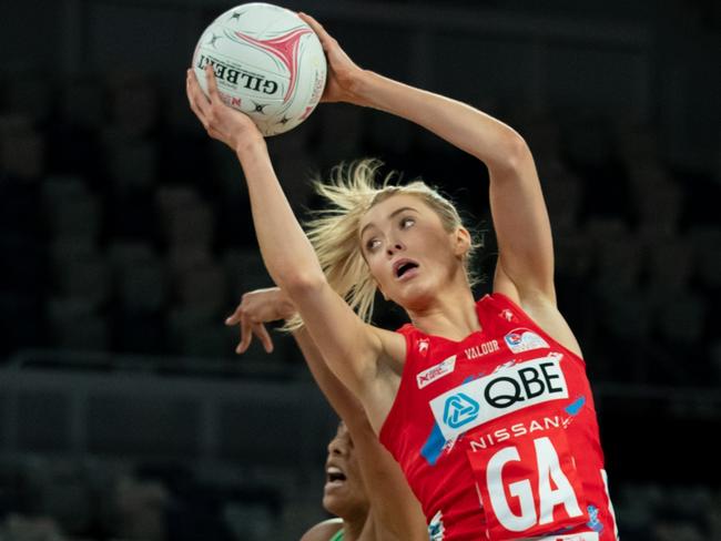 MELBOURNE, AUSTRALIA - JULY 04: Helen Housby of the Swifts catches the ball during the round nine Super Netball match between Sydney Swifts and West Coast Fever at John Cain Arena, on July 04, 2021, in Melbourne, Australia. (Photo by Mackenzie Sweetnam/Getty Images)