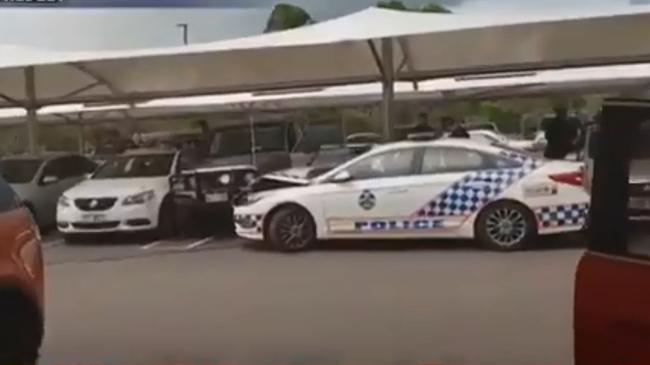 A crime scene was set-up after police shot at a car believed to be stolen car at an Upper Coomera shopping centre. Photo: Channel 7 News. 