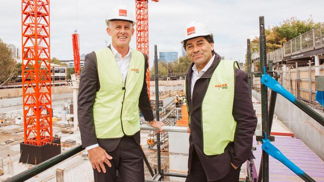 Qualitas’s Tim Johansen, left, inspects a development in Melbourne.