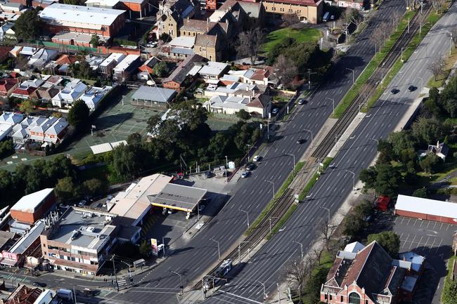 Aerial pictures of empty roads in Melbourne as strict stage 4 lockdowns are enforced. Dandenong Road facing east over Prahran near the chapel street intersection. Aaron Francis/The Australian