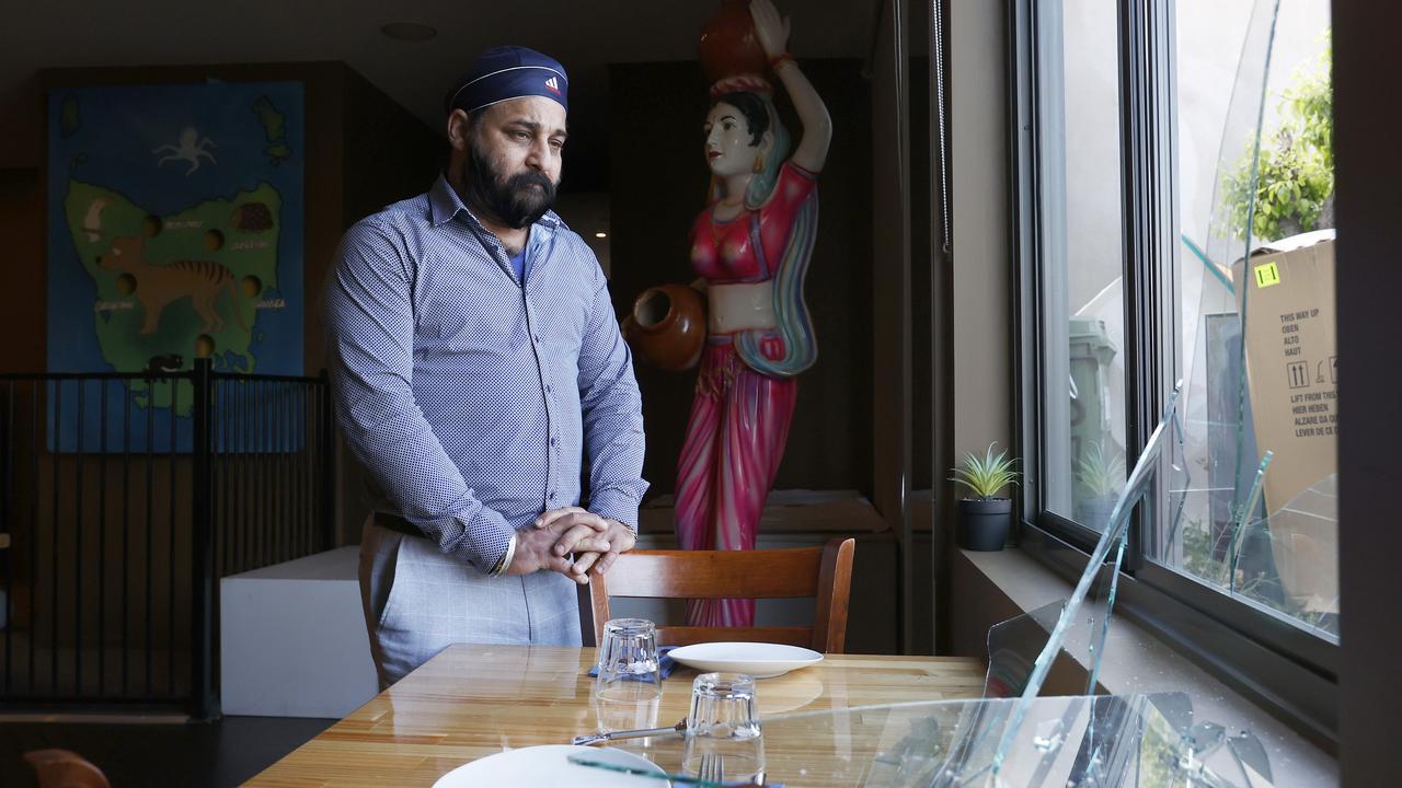 Jarnail 'Jimmy' Singh owner of Dawat The Invitation Indian restaurant at Bellerive who arrived at the restaurant to find one of it's windows had been smashed in. He has experienced similar incidents in the past. Picture: Nikki Davis-Jones