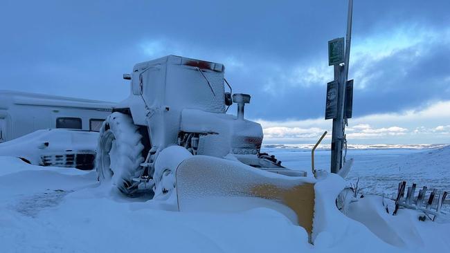 Snow covered everything — including the equipment used to clear it. Picture: Paul Wright