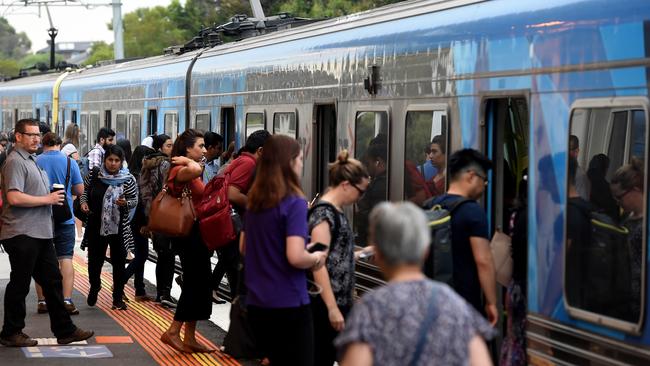 Train passengers at Narree Warren board a city bound train on the Pakenham line. Bus replacements finished on the 13 January. Picture: Nicole Garmston