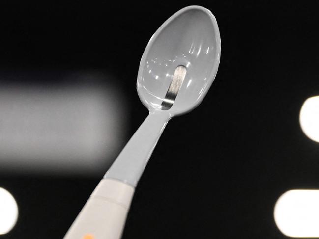 The Kirin Flavor-Enhancing Electronic Salt Spoon, which uses a weak electric current to concentrate sodium ion molecules food for increased Unami and salt flavor in low-sodium foods and encourage a lower salt diet, is displayed during CES Unveiled ahead of the Consumer Electronics Show (CES) in Las Vegas, Nevada on January 5, 2025. Gadgets, robots and vehicles imbued with artificial intelligence will once again vie for attention at the Consumer Electronics Show, as vendors behind the scenes will seek ways to deal with tariffs threatened by US President-elect Donald Trump. The annual Consumer Electronics Show (CES) opens formally in Las Vegas on January 7, 2025, but preceding days are packed with product announcements. (Photo by Patrick T. Fallon / AFP)