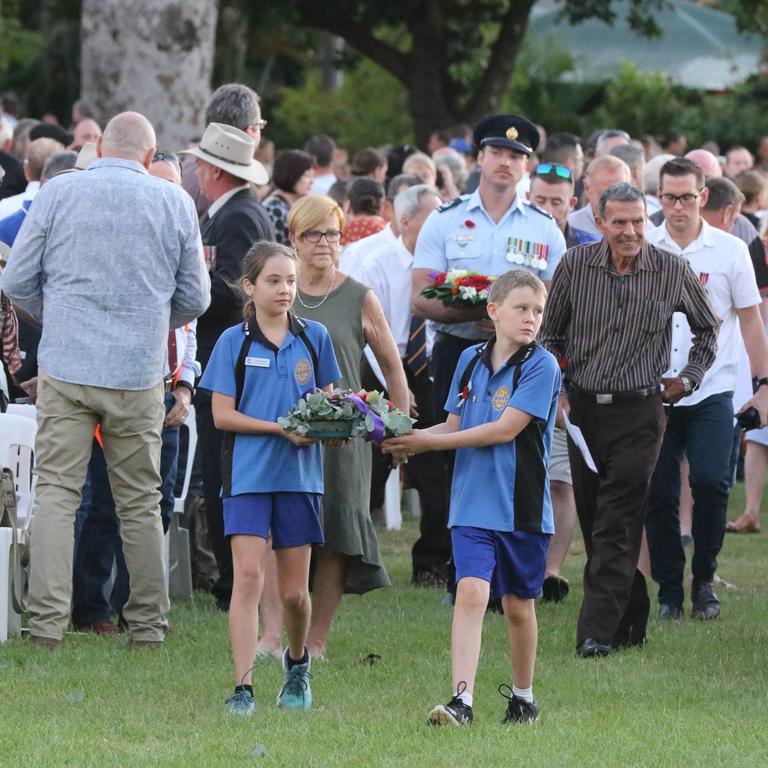 Elaine Smith and Isaac Chandler from Parap Primary at The Dawn Service at Darwins Cenotaph commemorating ANZAC Day 2021. Picture Glenn Campbell