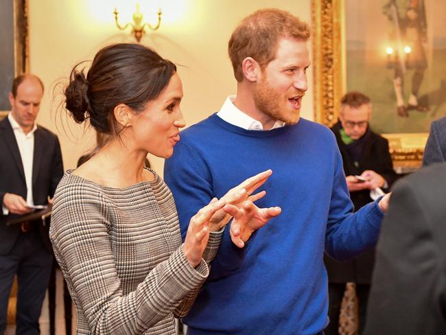 Prince Harry and Meghan Markle chat with people inside the Drawing Room during a visit to Cardiff Castle on January 18, 2018 in Cardiff, Wales. Picture: Getty
