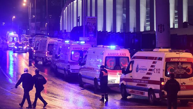 Ambulances are seen near Vodafone arena stadium on the site where a car bomb exploded near the stadium of football club Besiktas in central Istanbul on December 10, 2016.