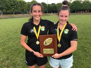 Chloe Cocks and Holly Anlezark celebrate Paris World Games Rugby Sevens victory. The West Bulldogs players were part of the Tribe Rugby Sevens representative that went through the competition undefeated. Picture: Contributed