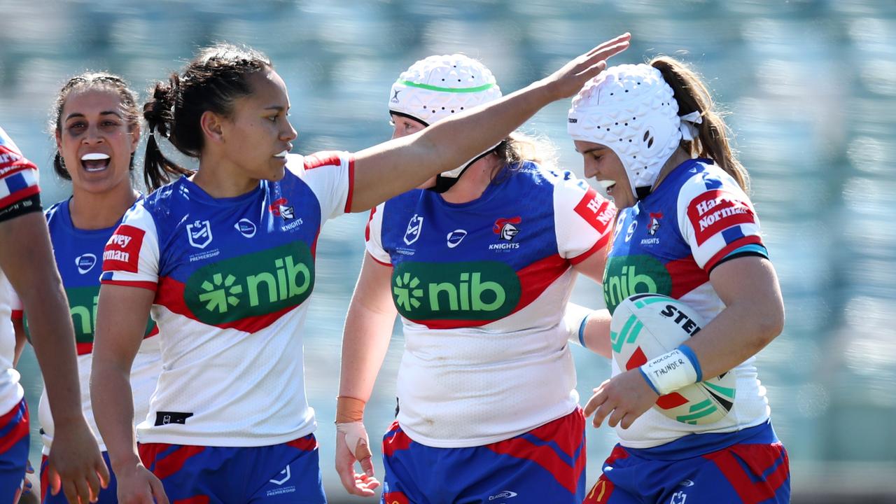 CANBERRA, AUSTRALIA - SEPTEMBER 02: Jesse Southwell of the Knights celebrates scoring a try with teammates during the round seven NRLW match between Canberra Raiders and Newcastle Knights at GIO Stadium on September 02, 2023 in Canberra, Australia. (Photo by Jason McCawley/Getty Images)